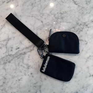 Lululemon black dual pouch wristlet.